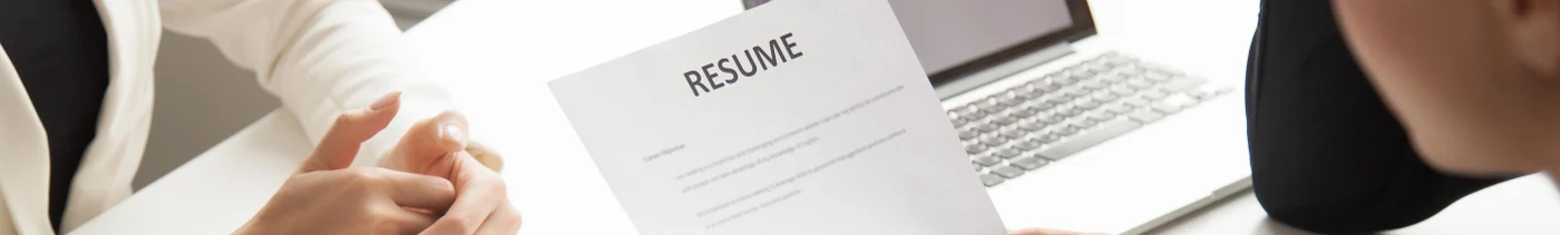 8b71dd83-74da-4d95-b236-b6fe9330e50d-company-representatives-reading-applicant-resume-hiring.jpg
